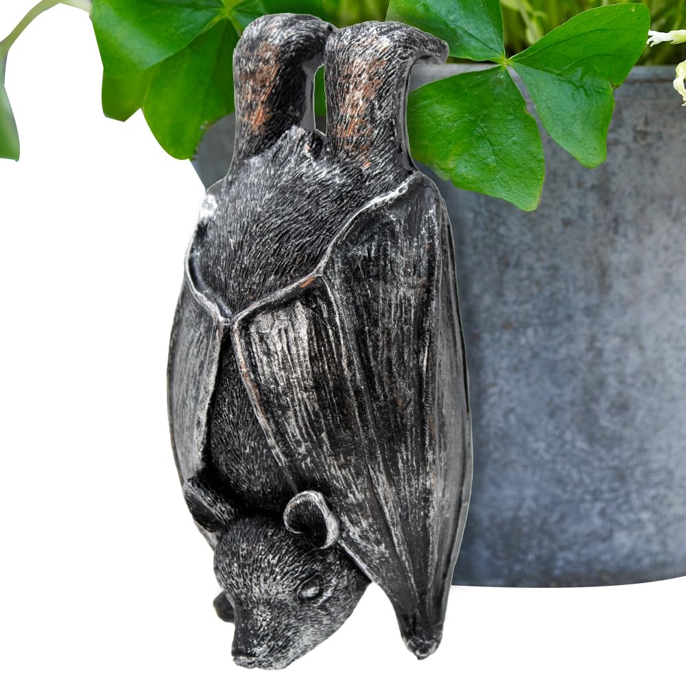 Black bat planter hanger styled on a flower pot